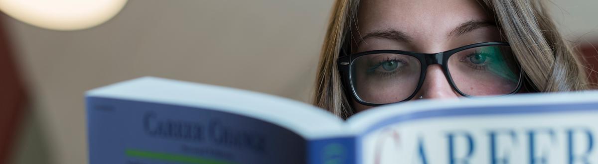 student reading career change book