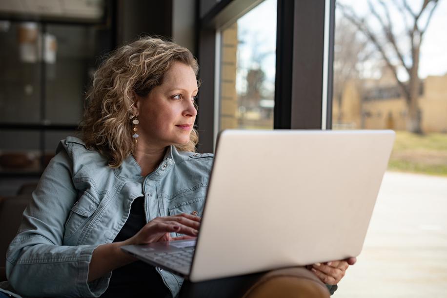 female student with laptop